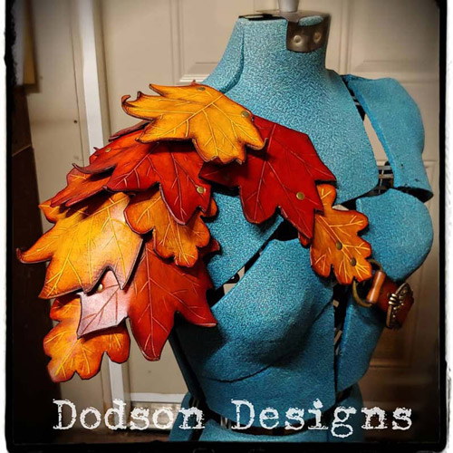 Faerie leaf pauldron. Made of Yellow, red and orange maple leaves made out of leather.