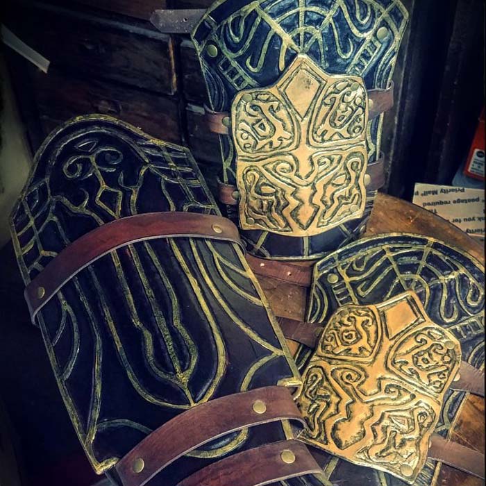 Black and gold leather bracers.