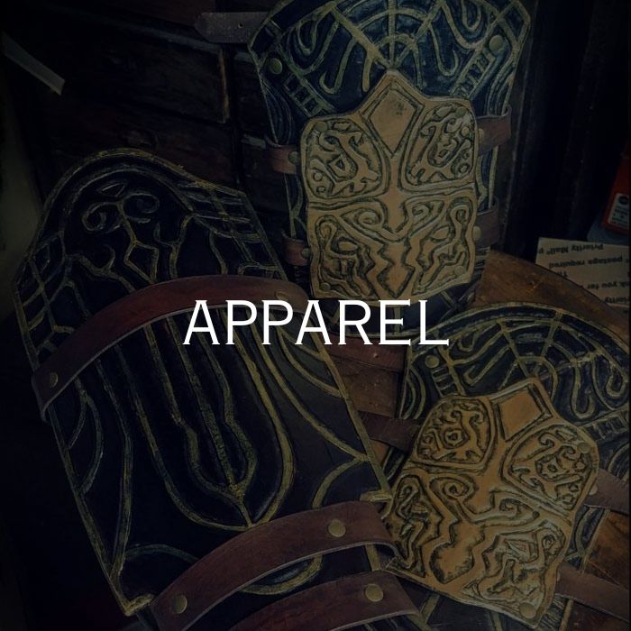 Several tooled leather bracers with the word "Apparel" overlaid. Link for apparel page.