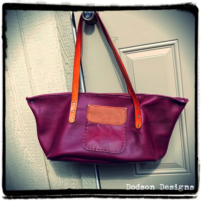 Long purple leather purse.