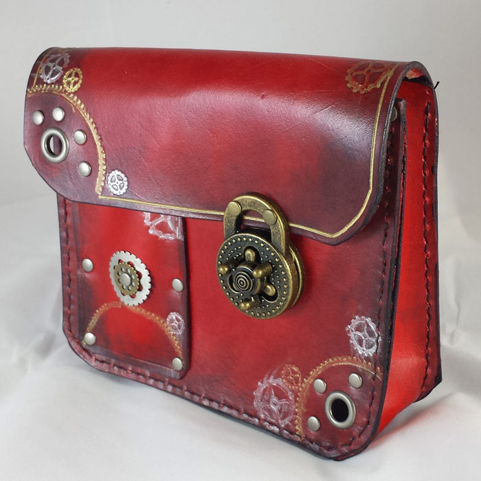 Red sturdy leather steampunk styled pouch.